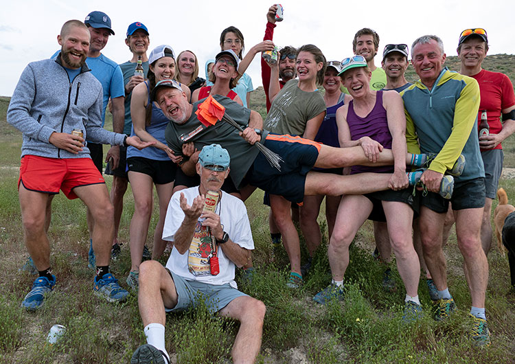 Runners of Mesa Monument Striders at the trailhead in Loma, Colorado