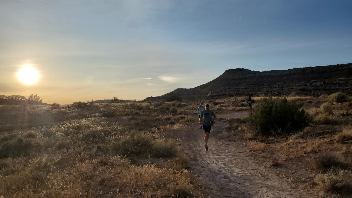 Runners on the trails in Loma, Colorado.