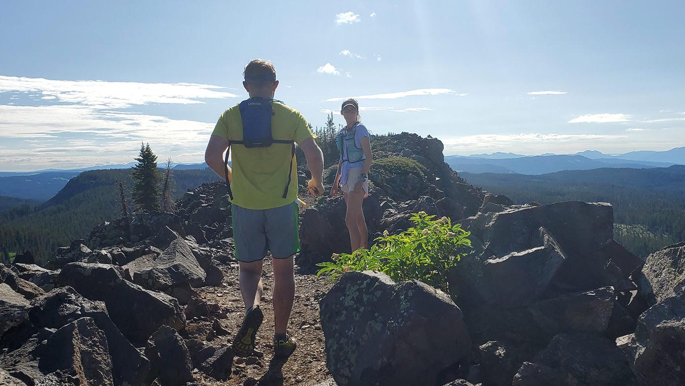 Runners atop Crag Crest on Grand Mesa in western Colorado.