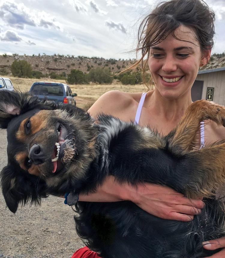 Michelle holding her "Badger" dog named Bruce